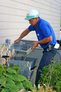 technician-repairing-the-outdoor-unit-of-an-air-conditioner